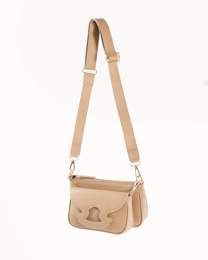 Two beige handbags with gold accents on a white background